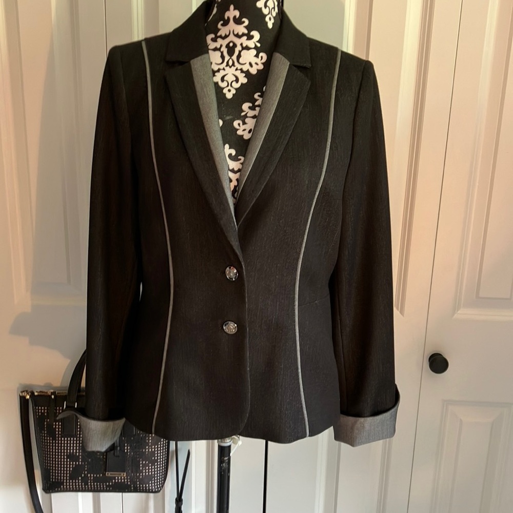 Dark black gray blazer with light gray piping detail and accent